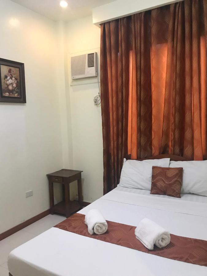 Aquari Travellers Inn Пуэрто-Принцеса Экстерьер фото
