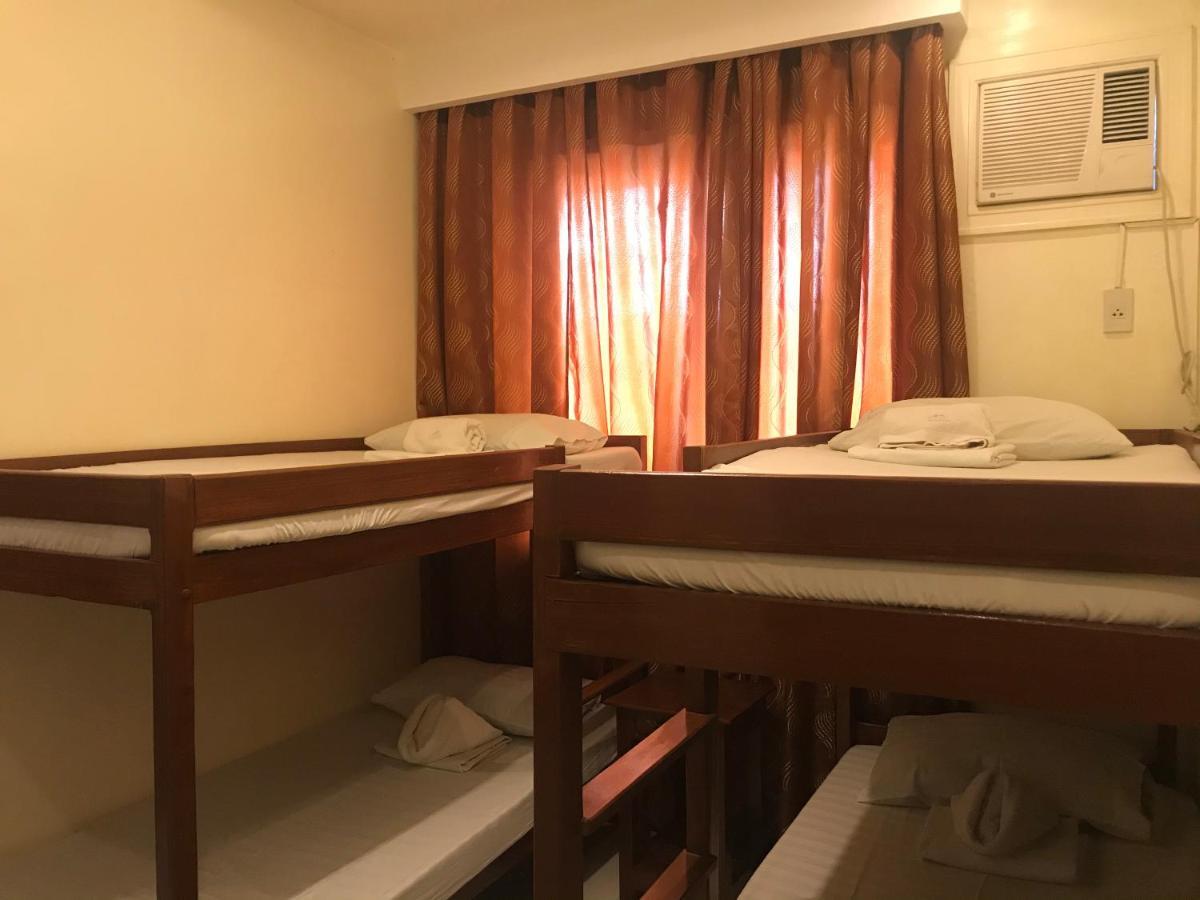 Aquari Travellers Inn Пуэрто-Принцеса Экстерьер фото